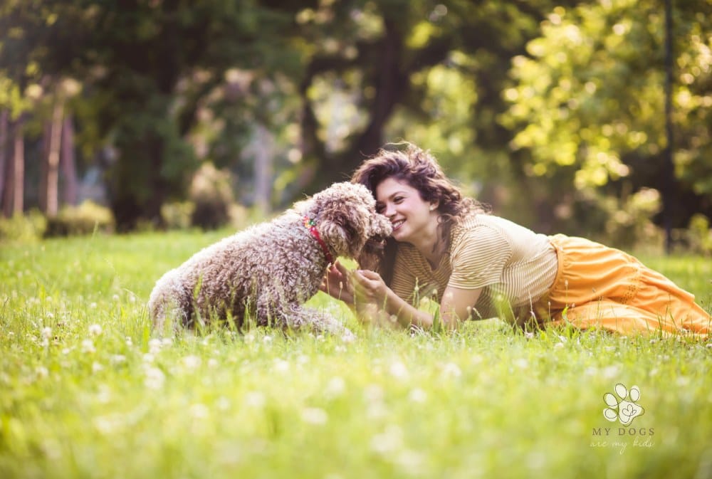 Dogs are the best human friends. Woman in nature with dog.